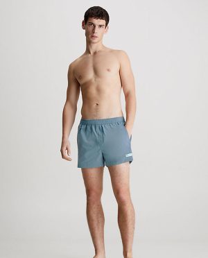 CK. ΜΑΓΙΩ SHORTS ΜΠΕΖ ΛΑΣΤΙΧΟ